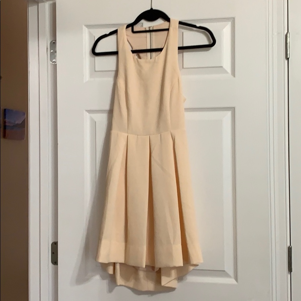 Light Creme colored open backed dress